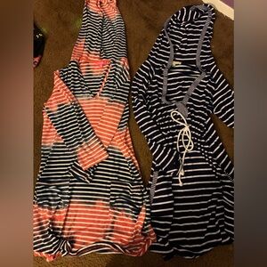 Two hooded beach cover ups .